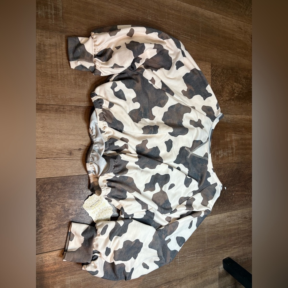 Altar'd State Black and Cream Cow Print Top
